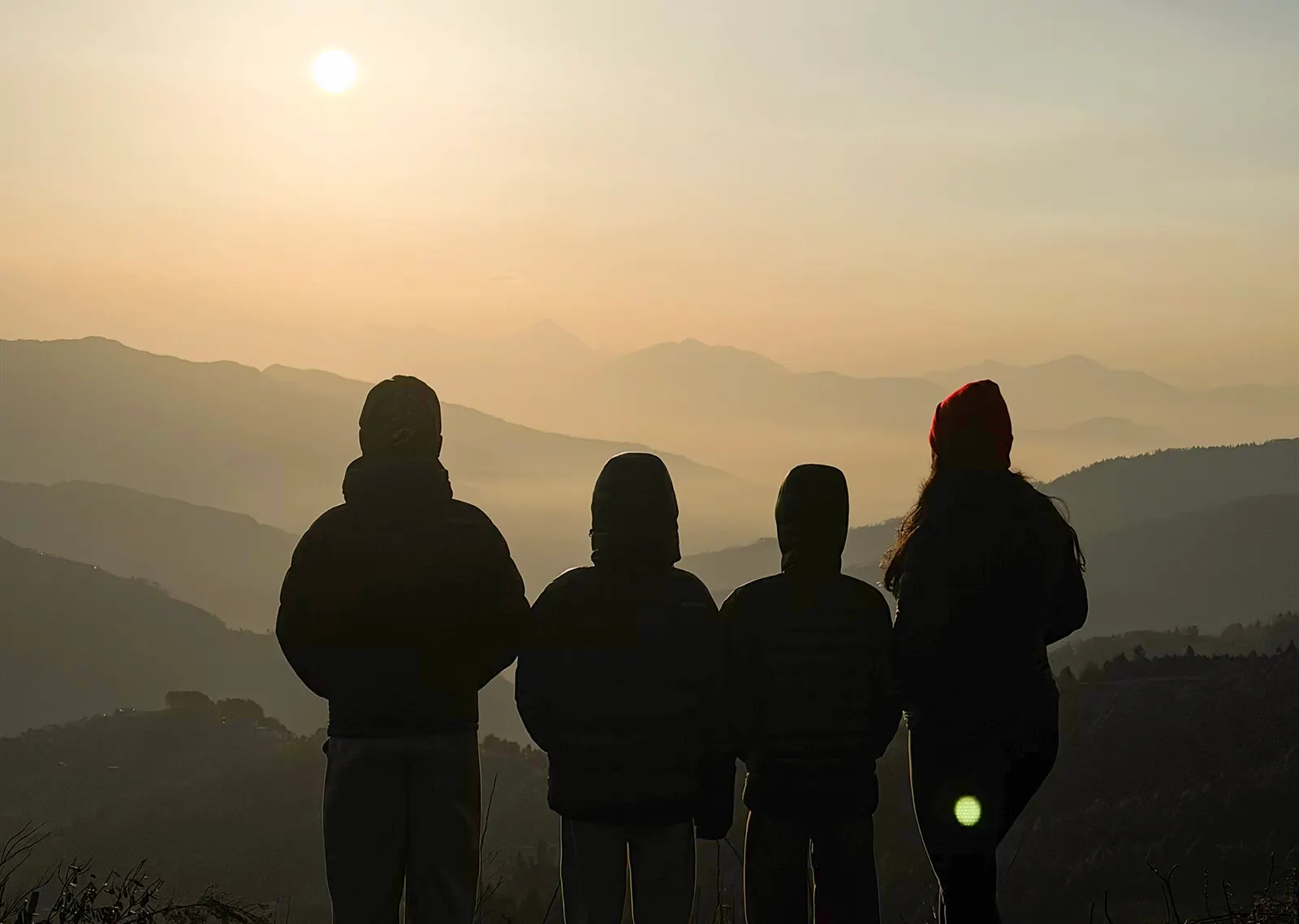 Peaceful sunrise above the mountains as seen from Jhapre Village, Nepal.