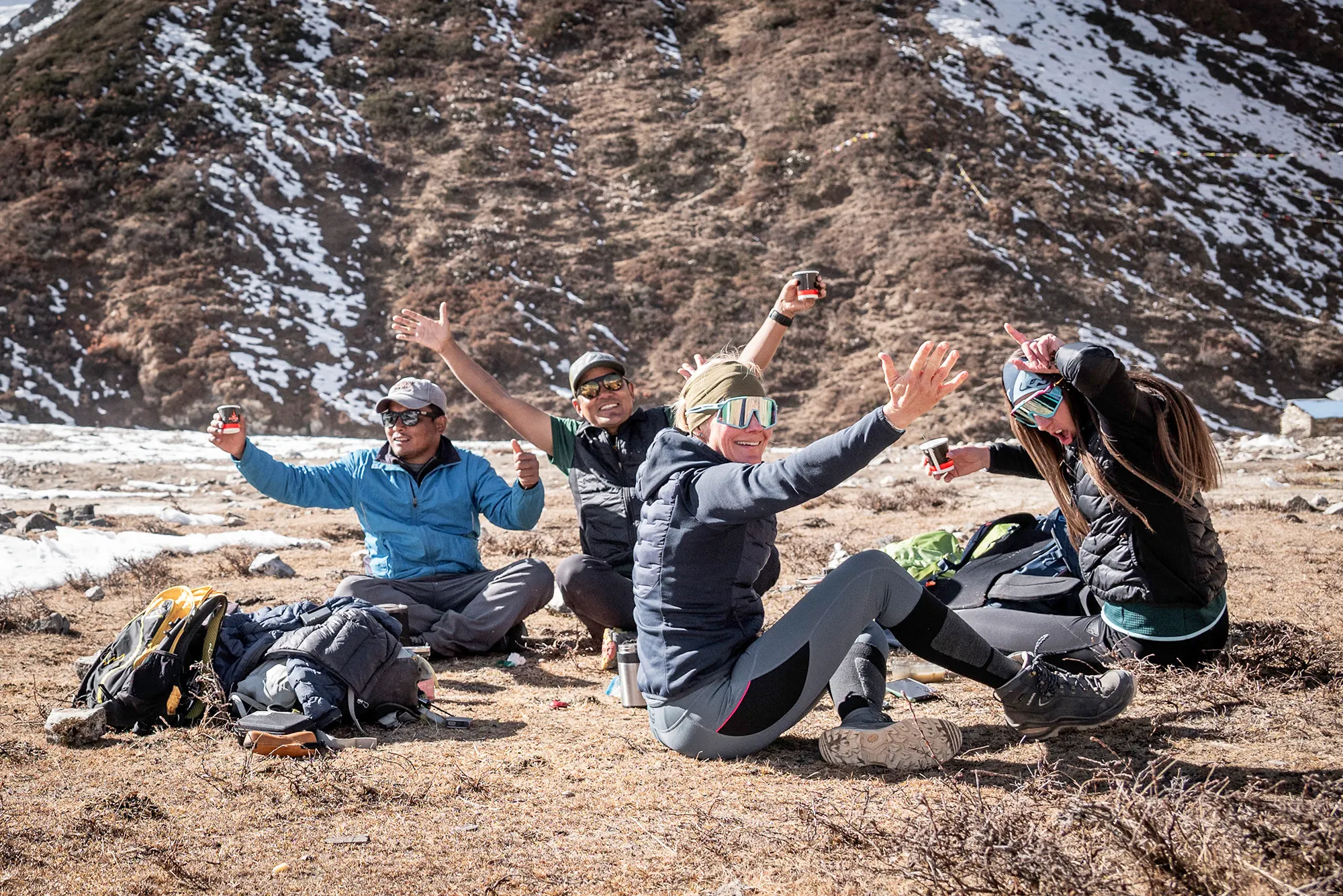 A Himalayan village beneath snow-covered mountains