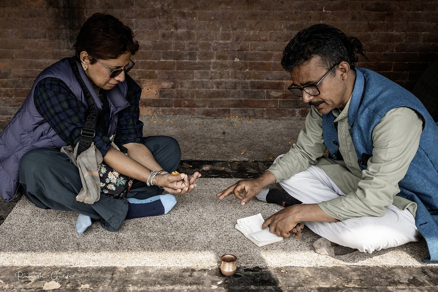  At Pashupatinath Temple, doing Puja for departed souls. 