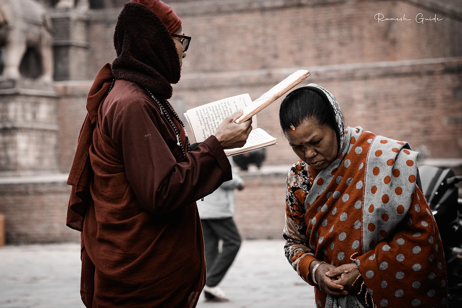  Buddhist Monk at Bhaktapaur blessing to local people. 